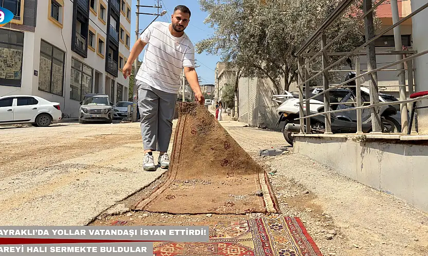 Bayraklı'da yollar vatandaşı isyan ettirdi! Çareyi halı sermekte buldular